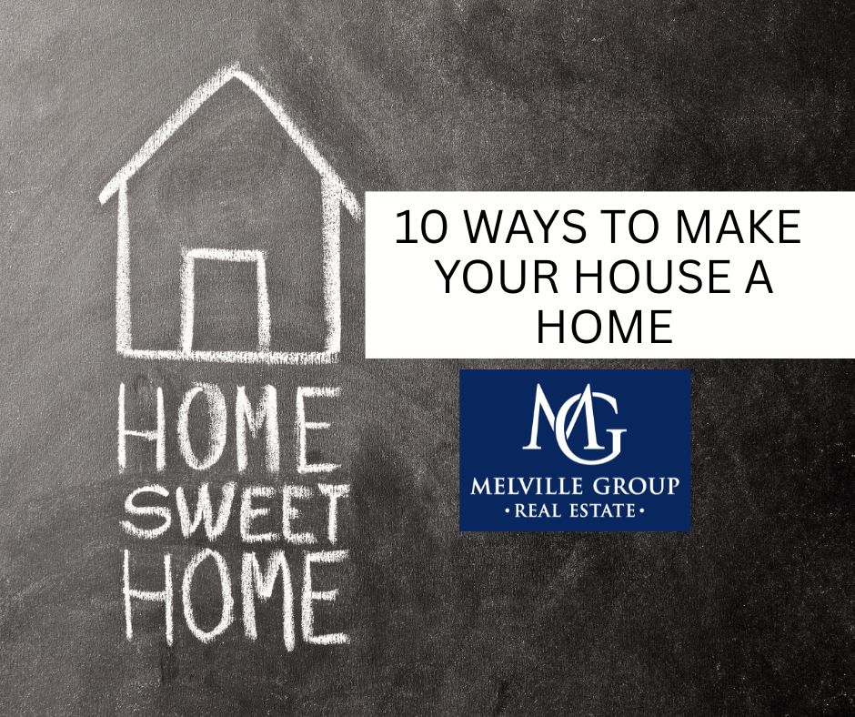 A chalkboard with a drawing of a house and the word Home Sweet Home
